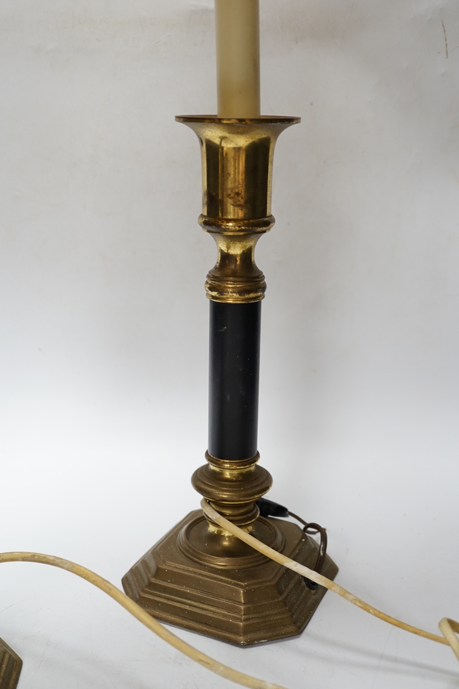 A pair of brass and black table lamps and shades, 64.5cm high